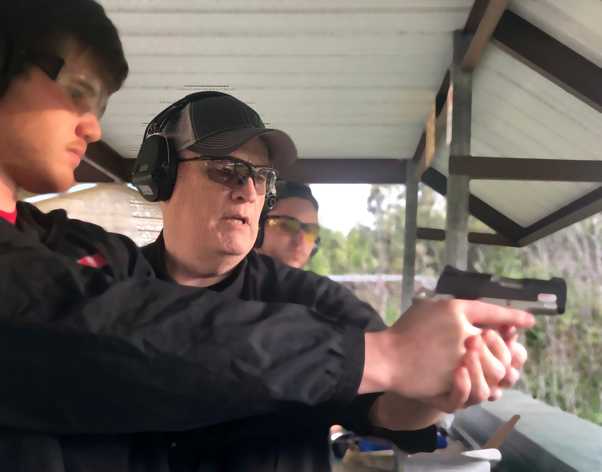 Richard Worthey doing training on how to use a pistol